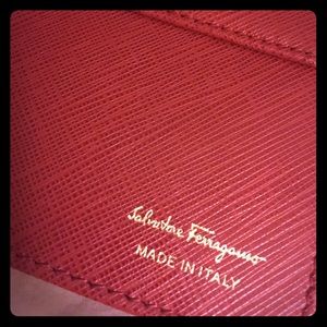 NEW. Salvatore Ferragamo with Gold Chain Strap